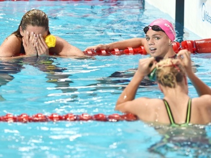 JOHANSSON Jennie SWE Gold Medal, EFIMOVA Yuliya RUS Bronze, MEILUTYTE Ruta LTU  Women's 50m Breaststroke 