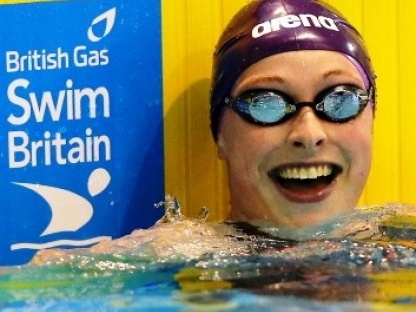RACHEL KELLY GLASGOW, SCOTLAND - APRIL 11:  Rachael Kelly reacts after winning the Women's 100m Butterfly Final on day two of the British Gas Swimming Championships 2014 at Tollcross International Swimming Centre on April 11, 2014 in Glasgow, Scotland.  (Photo by Clive Rose/Getty Images)