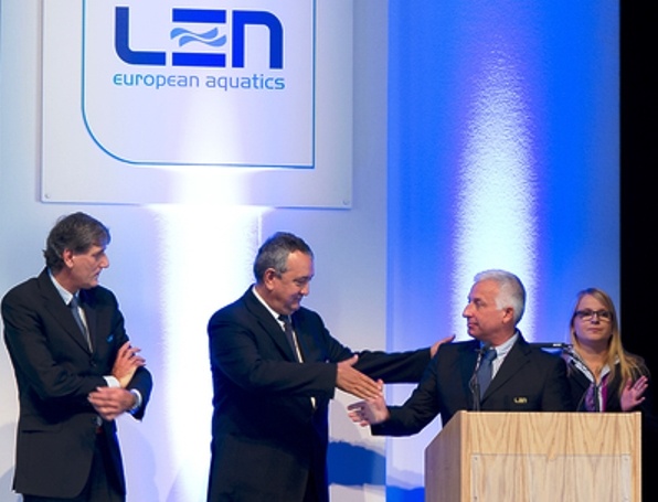 Paolo Barelli LEN President (middle -L) shaking hand with Paulo Frischknecht , newly appointed LEN Director (middle -R) among the LEN office staff 