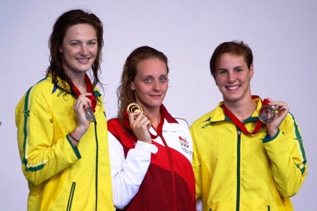 GLASGOW, SCOTLAND - JULY 26:  Gold medallist Francesca Halsall of England poses with silver medallist Cate Campbell of Australia and bronze medallist Bronte Campbell of Australia during the medal ceremony for the Women's 50m Freestyle Final at Tollcross International Swimming Centre during day three of the Glasgow 2014 Commonwealth Games on July 26, 2014 in Glasgow, Scotland.  (Photo by Robert Cia